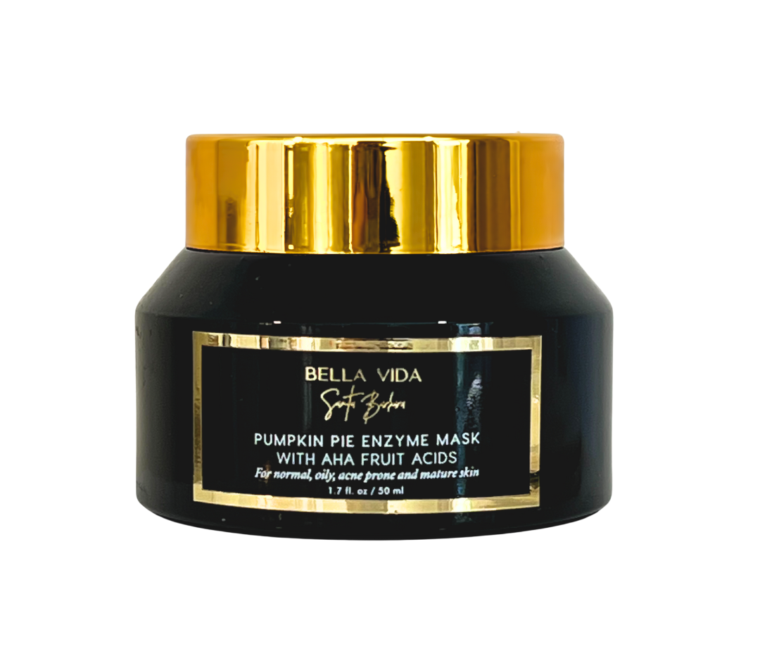 Black jar with gold lid containing Bella Vida pumpkin pie enzyme mask on a white background